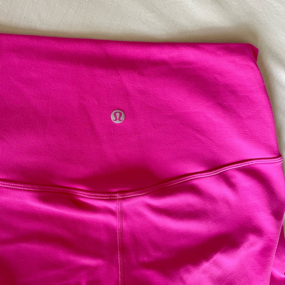 Like New. Worn Once. Lululemon Hot Pink crop yoga leggings. Size 8. Excellent